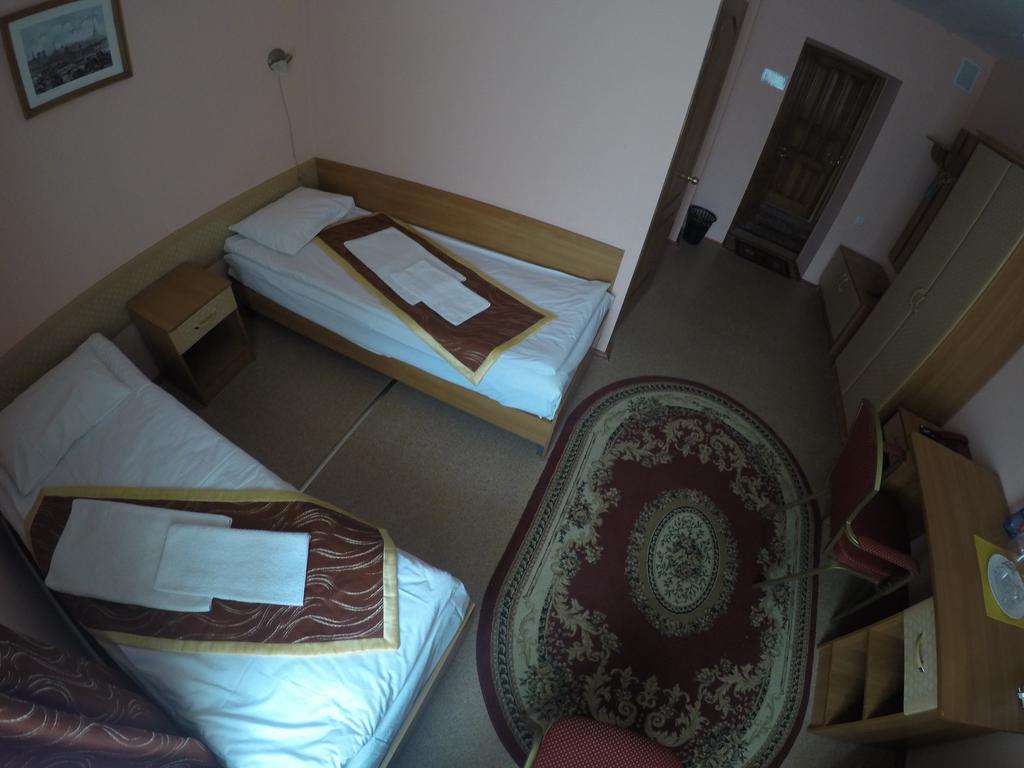 Kurmet Hotel Уралск Стая снимка